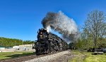 NKP 765 passes through town.